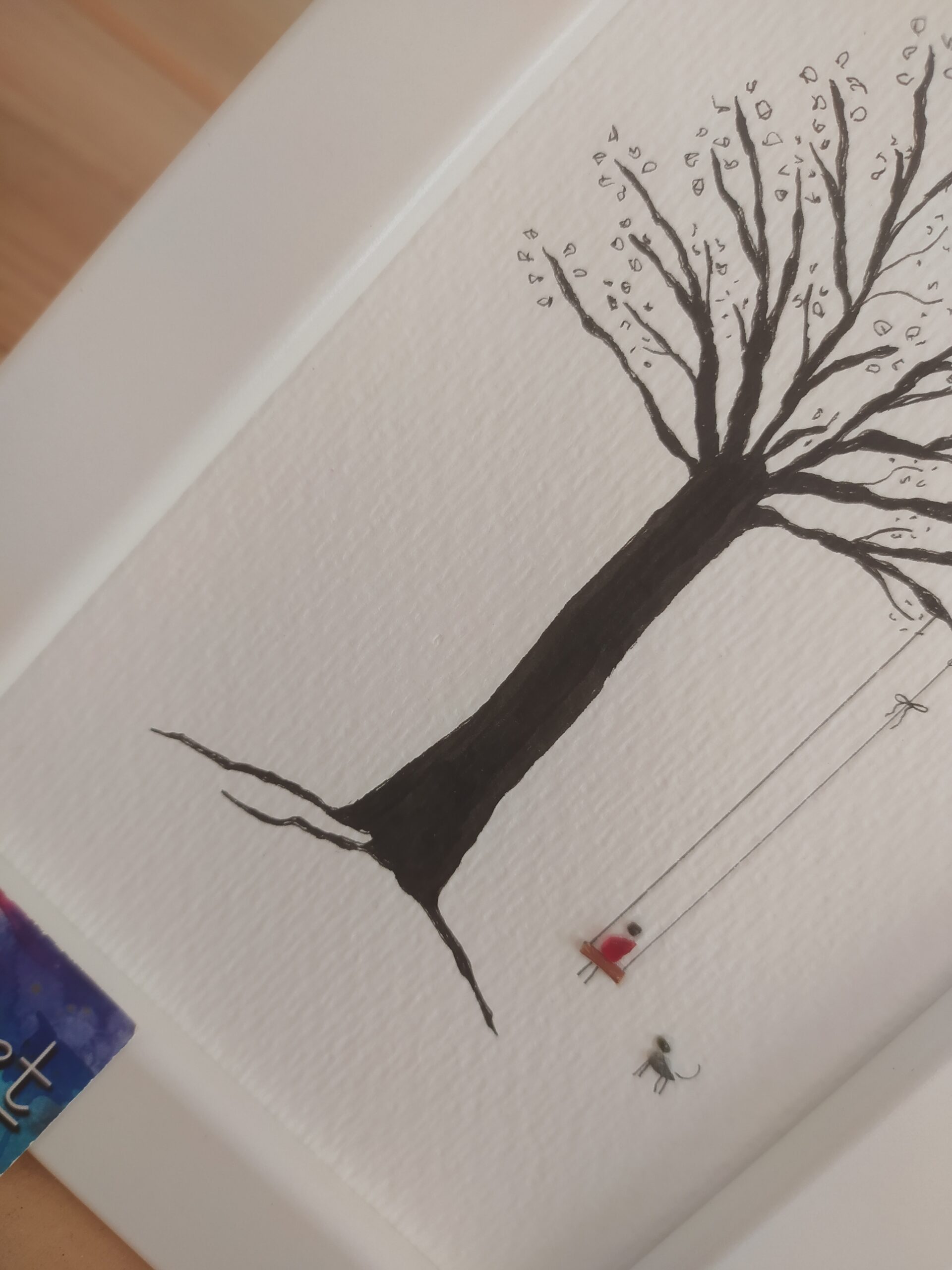 detail sea glass tree with a swing