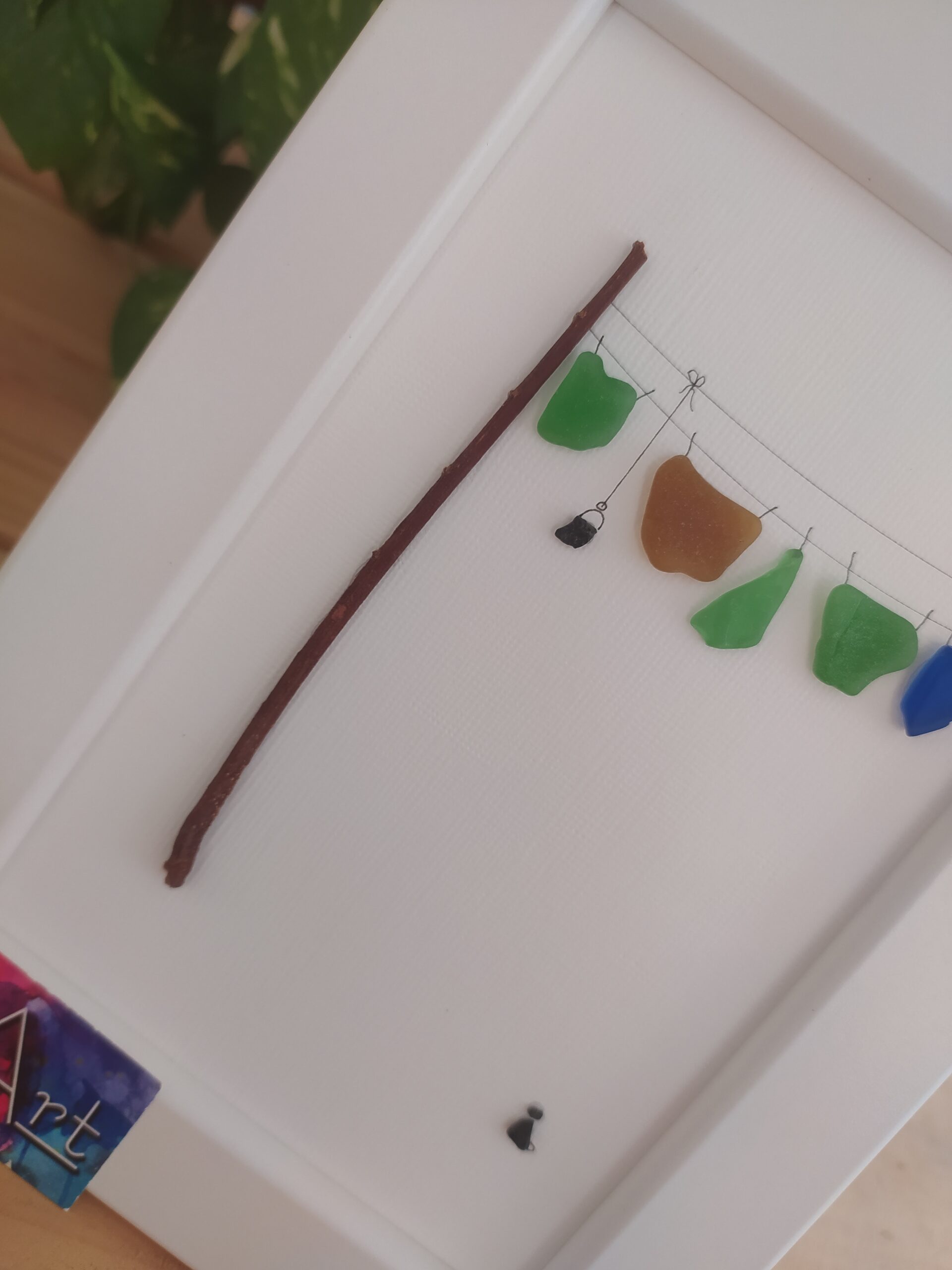 Detail laundry line made of sea glass